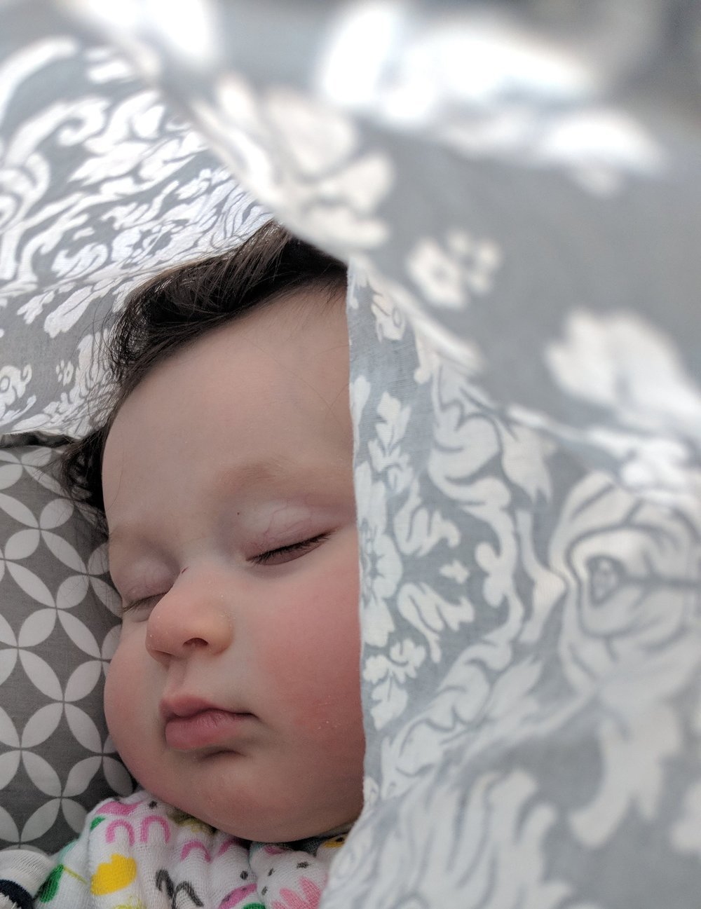 Napping on the Boppy pillow.