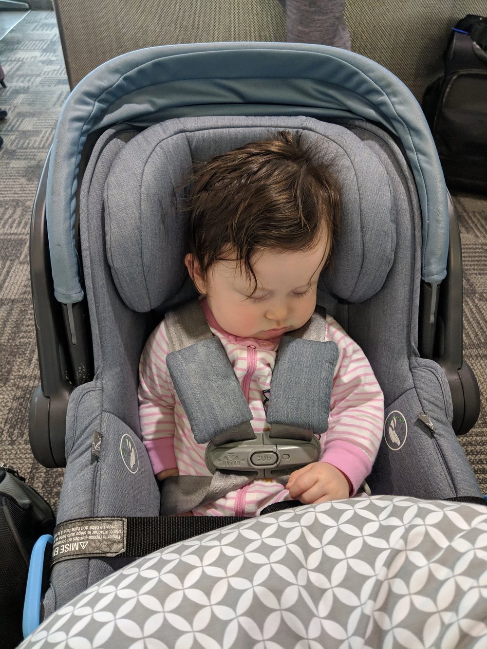 Car seat, stroller, Boppy in the walking-through-the-airport configuration.